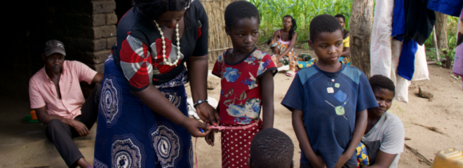 A child home visit with the Malawi team